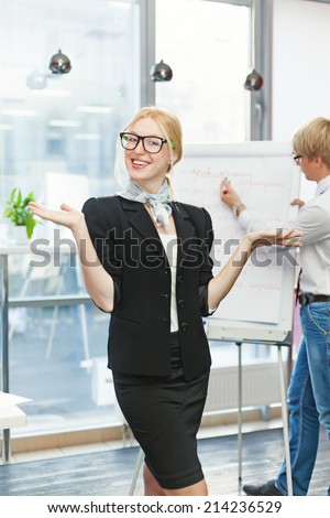 woman making a presentation with her assistant
