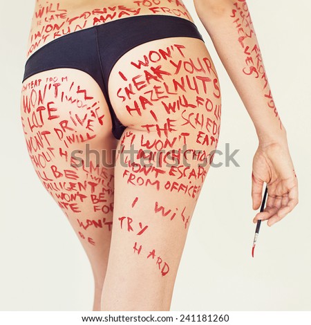 conceptual photo of buttocks lined with promises