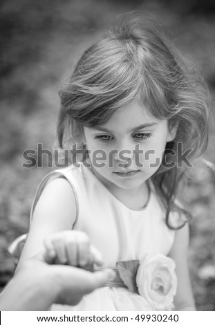 stock photo little girl holding mother's hand