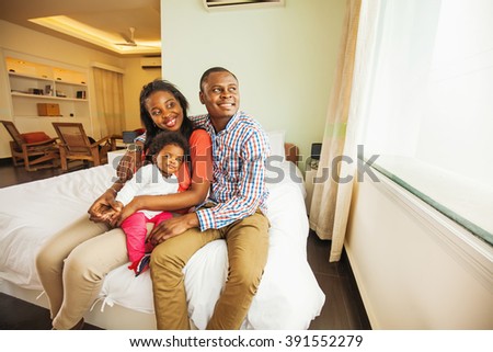 adorable african family at home