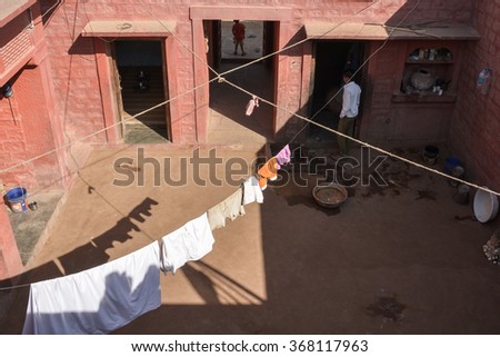 Thar Desert, India\
December 26, 2014:\
Family in Home\'s Courtyard in the Thar Desert, India.