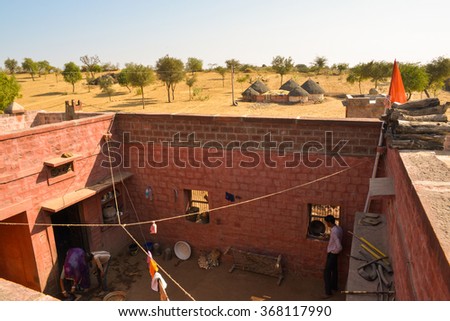 Thar Desert, India
December 26, 2014:
Family in Home's Courtyard in the Thar Desert, India.