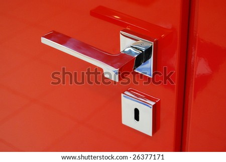 red plastic door with handle and lock