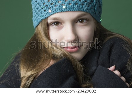 Teenager all bundled up in warm clothing
