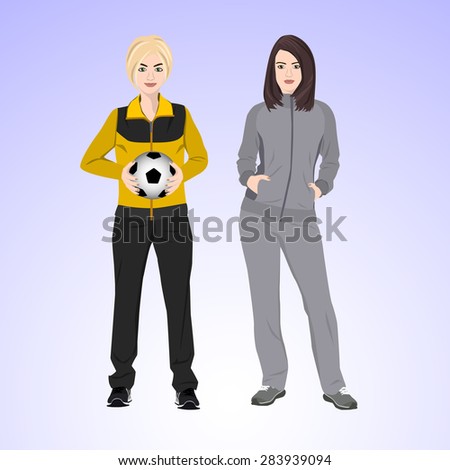 Two sports woman with a soccer ball.