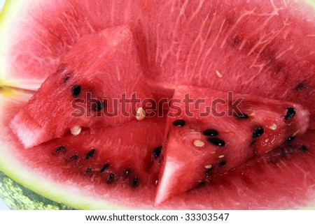 Closeup of red juicy watermelon with black seeds