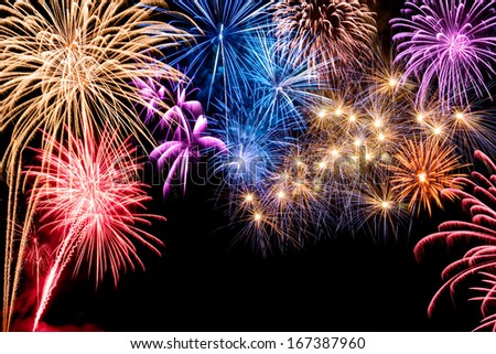 Gorgeous multi-colored fireworks display on black background with copyspace Gorgeous multi-colored fireworks display on black background with copyspace