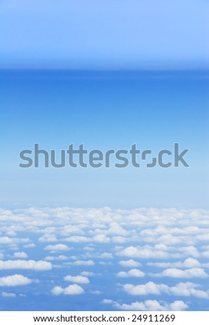 Bird?s eye view of clouds and light blue earth atmosphere layers