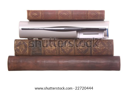 Pile of old leather bound books with a digital TV hard drive