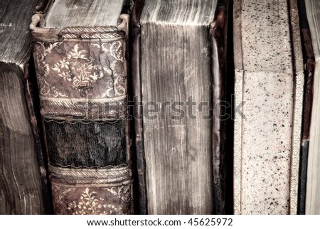 Detail of a row of old leather bound books
