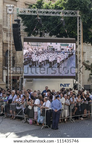 VALLETTA, MALTA - AUG 25 - Details from the large crowd during the state funeral of former Prime Minister of Malta Dom Mintoff in Valletta on 25 August 2012