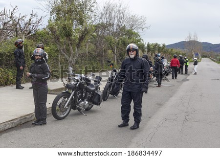 SICILY, ITALY - APRIL 5, 2014: Members of H.O.G. Malta Chapter ride their Harley-Davidson motorcycles in Sicily. Harley Owners Group is made up of various local chapters from around the world.