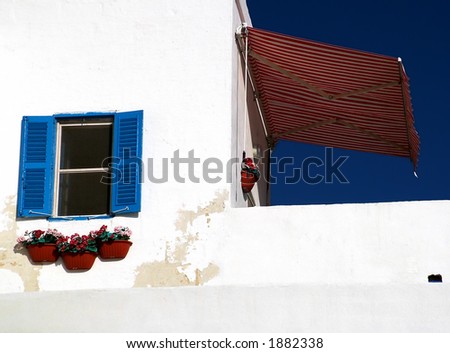 Whitewashed seaside house typical of Mediterranean countries