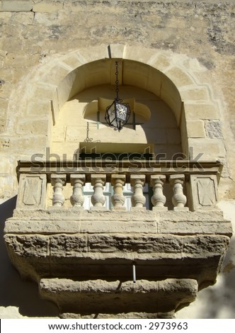Little baroque and medieval balcony reminescent of the Shakespearian novel. This balcony is found in the old city of Mdina, Malta