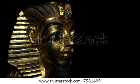 Gold mask motif of the ancient boy Pharaoh in Egypt
