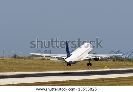 Civil aircraft taking off at an airfield in Malta