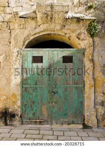 An old garage ore remissa door in Mdina in Malta
