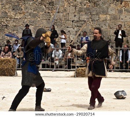 MDINA, MALTA - APR19 -  Knight swordfight during medieval reenactment in the old city of Mdina in Malta April 19, 2009