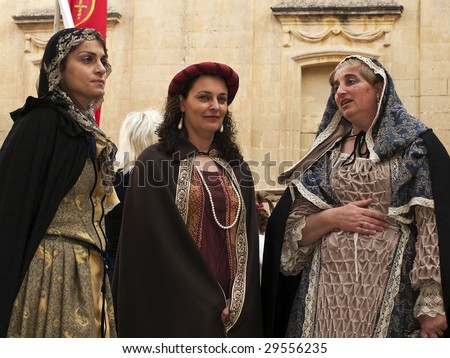 MDINA, MALTA - APR 19 : Medieval reenactment of noble women in the old city of Mdina  April 19, 2009 in Mdina, Malta.