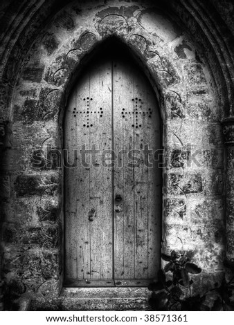 Gothic doorway to St Simeon Chapel in Wardija with eerie childlike handprint on door