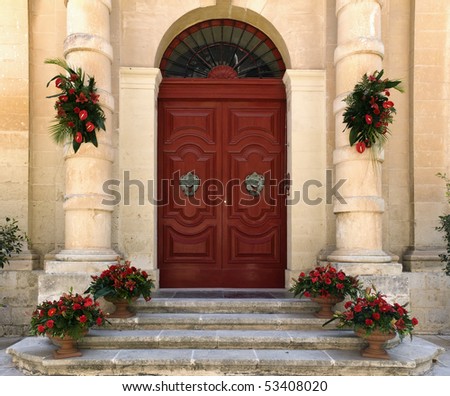 A door in Mdina decorated with beautiful flowers