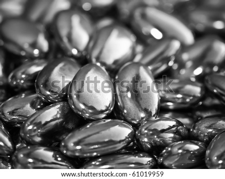 Abstract image showing traditional Maltese perlini which are almonds covered in icing. In this case they are made of solid silver