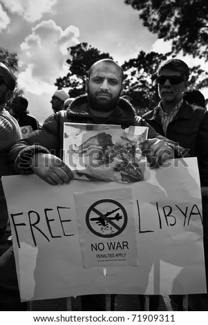 ATTARD, MALTA - FEB 22 : An unidentified Libyan anti-Gaddafi protester during a protest in front of the Libyan Embassy on February 22, 2011 in Attard, Malta.