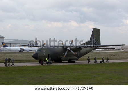 LUQA, MALTA - FEB 24 : German Air Force Hercules C-130 aircraft use Malta as hub and transit point for evacuation operations from Libya on Feb 24, 2011 in Luqa, Malta.