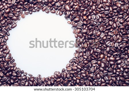 Coffee beans texture. White circle made for text usage.