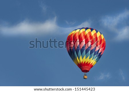 ALBUQUERQUE, NM - OCTOBER 10: A group of hot air balloons soar at Albuquerque International Hot Air Balloon Fiesta October 10, 2012 in Albuquerque, NM.