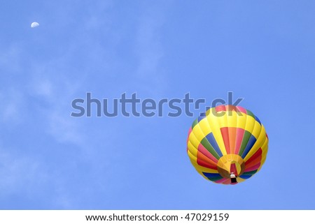 ALBUQUERQUE,  NM - OCTOBER 10: A hot air balloon soars at Albuquerque International Hot Air Balloon Fiesta October 10, 2009 in Albuquerque, NM.
