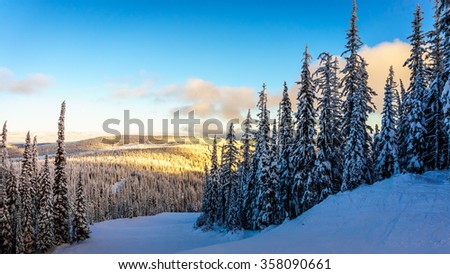 Sunset over the Shuswap Highlands from the ski slopes of Sun Peaks Resort in central British Columbia