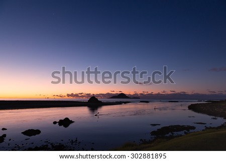 A peaceful, winter evening at the Whakatane River mouth in New Zealand. This stunning and colorful photo of Whale Island and the Bay of Plenty would be great for many various ideas and concepts.