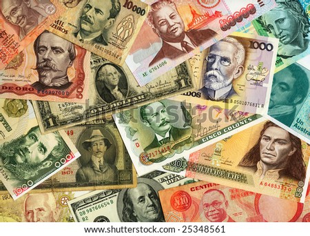 International paper currencies closeup, background.