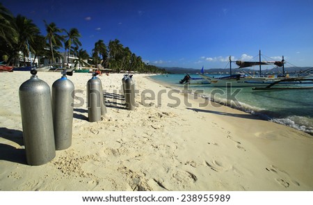 BORACAY BEACH,PHILIPPINES-FEBRUARY 27, 2014: Oxygen bottles waiting for divers on Boracay beach