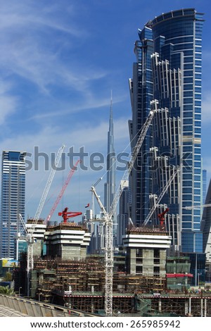 DUBAI,UNITED ARAB EMIRATES-DECEMBER 5, 2013:Construction of the new skyscraper at the centre of Dubai,United Arab Emirates