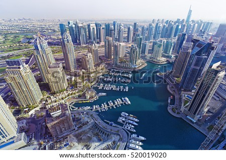 Beautiful Top view on Dubai Marina Skyscrapers and luxury yachts at the sunset,Dubai,United Arab Emirares