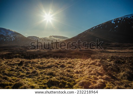 Sun over mountains