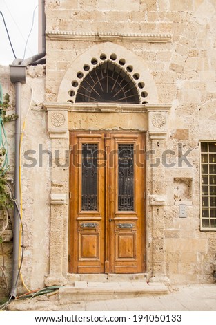 Grunge Wooden Decorated  Door in old Arabic House