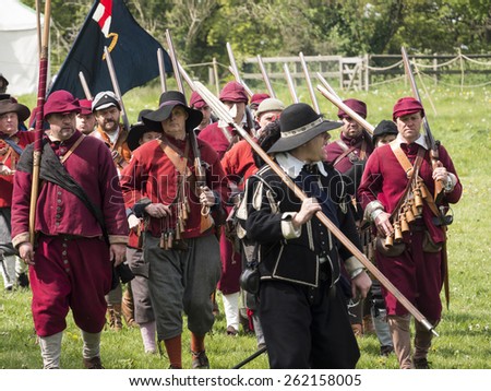 Actors wearing Stuart era,17th century,(reign of king Charles 1st) costumes.They are reenacting the siege of Bolsover Castle, in Derbyshire, UK, an event during the English Civil War.taken  05/05/2014