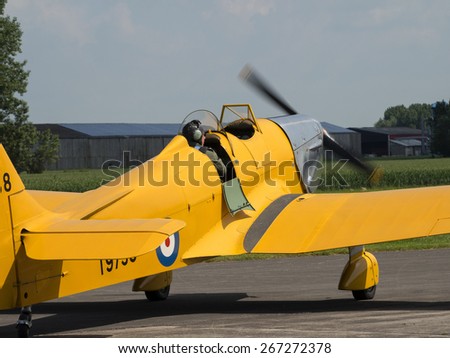 A Miles Magister 1930s monoplane pilot training aircraft at Breighton airfield,yorkshire,UK.taken 14/07/2013