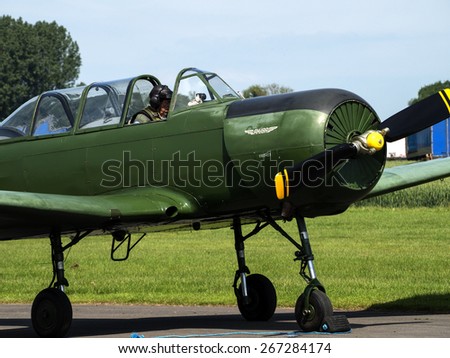 Russian built 1950s Yak two-seat pilot training aircraft at Breighton airfield,yorkshire,UK.taken 14/07/2013