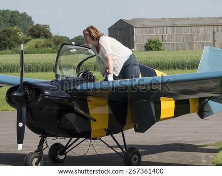 light aeroplane pilot at Breighton airfield, Yorkshire,Britain. taken 26/09/2014