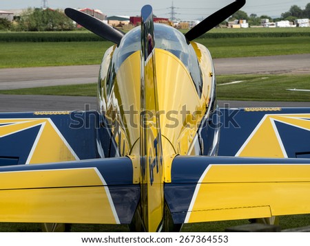 an Extra 200 aerobatic sport aircraft at Breighton airfield,Yorkshire.UK.taken 01/06/2014