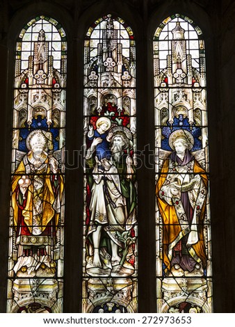 stained glass window at All Saints Church, Ashover village, derbyshire,UK . taken 22/03/2015