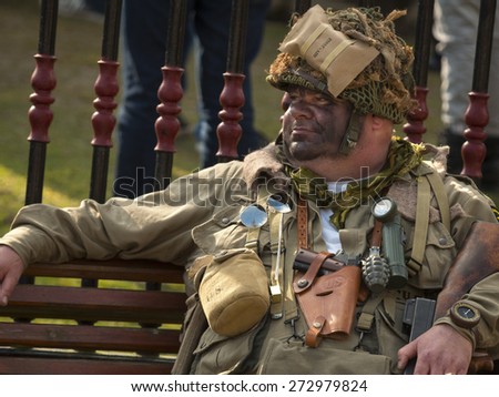 WW2 enthusiast in period British army uniform at a public event, derbyshire,UK.taken 05/04/2015