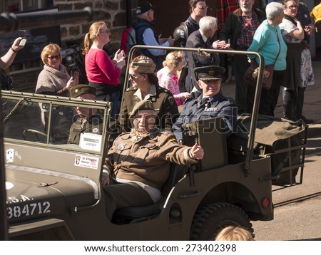 World war two enthusiasts reenact the era in period costumes and uniforms, at The National Tramway Museum,Crich,derbyshire,UK.taken 06/04/2015