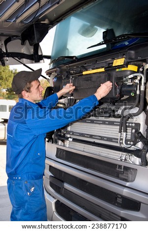 mechanic working on truck
