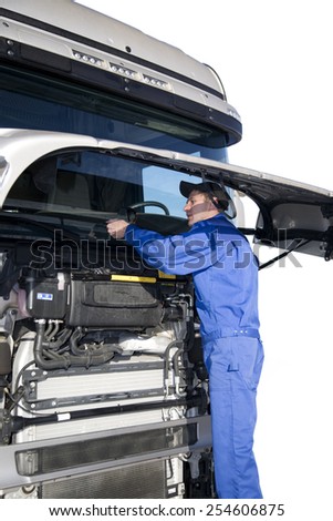 mechanics working on truck, isolated on white