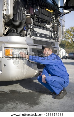 mechanics working on truck